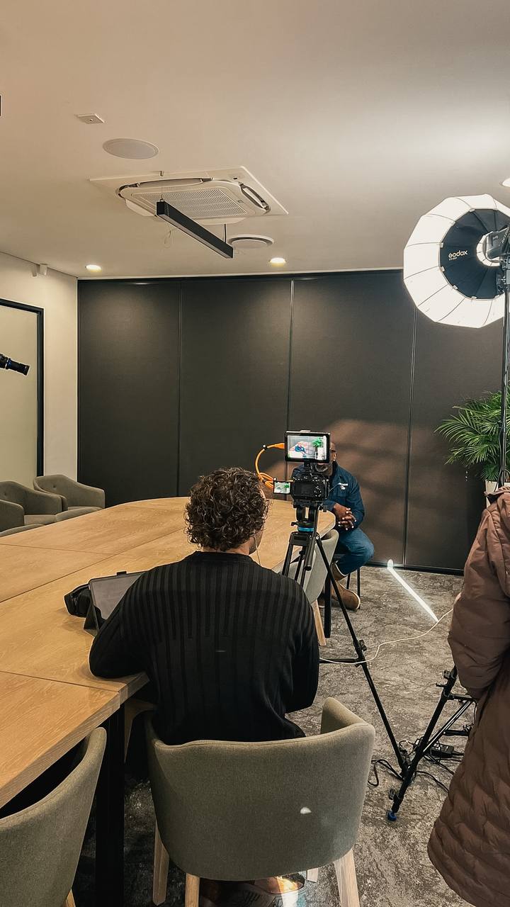 Lit interview setup in a boardroom
